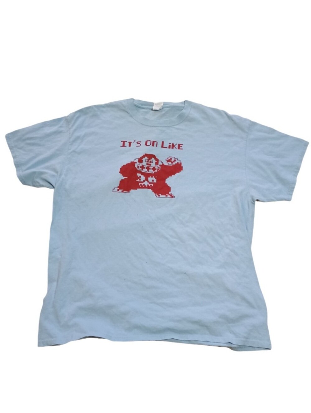Port & Company Light Blue Graphic Tee with Red Pixel Design